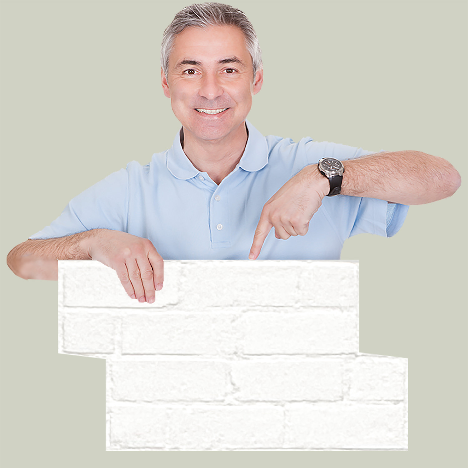 Man holding thin-skin of faux white brick